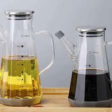 ظرف نگهداری روغن پیرکس ۵۵۰ میل درب استیل